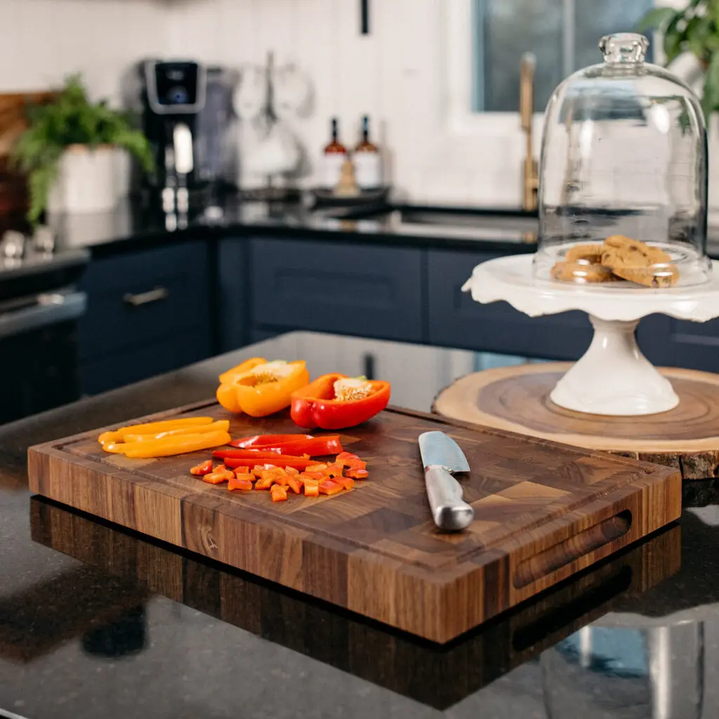 End grain cutting board on a kitchen counter